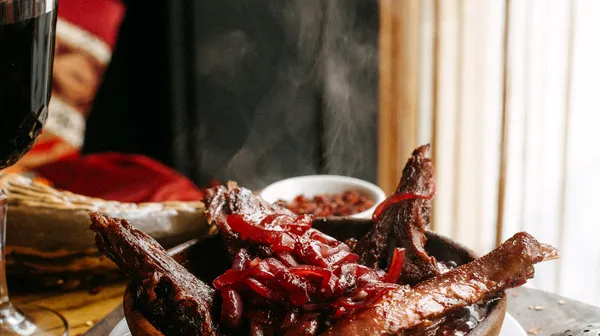 1770395809-fried-meat-with-pomegranate-table