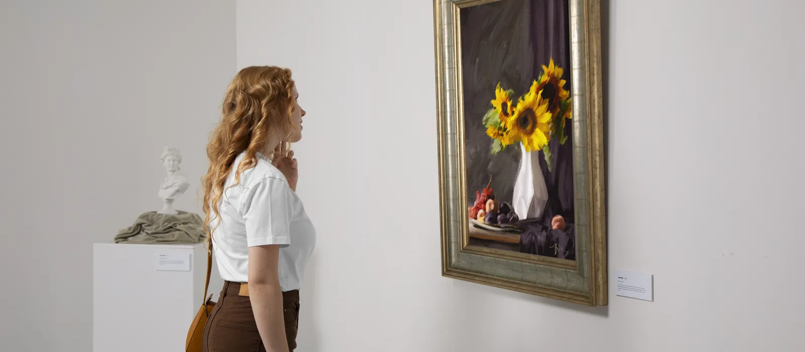 1769854443-side-view-woman-looking-painting