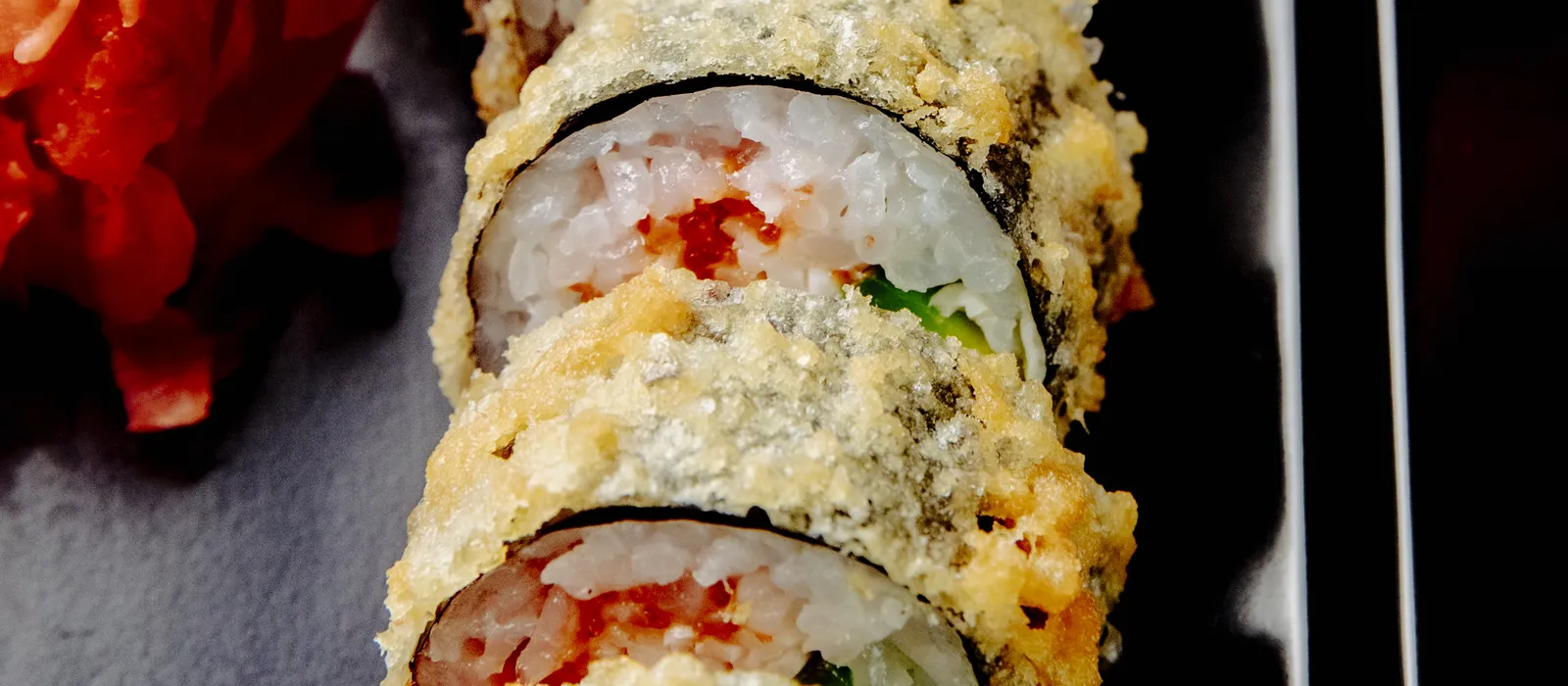 1770396108-tempura-maki-with-chicken-avocado-side-view