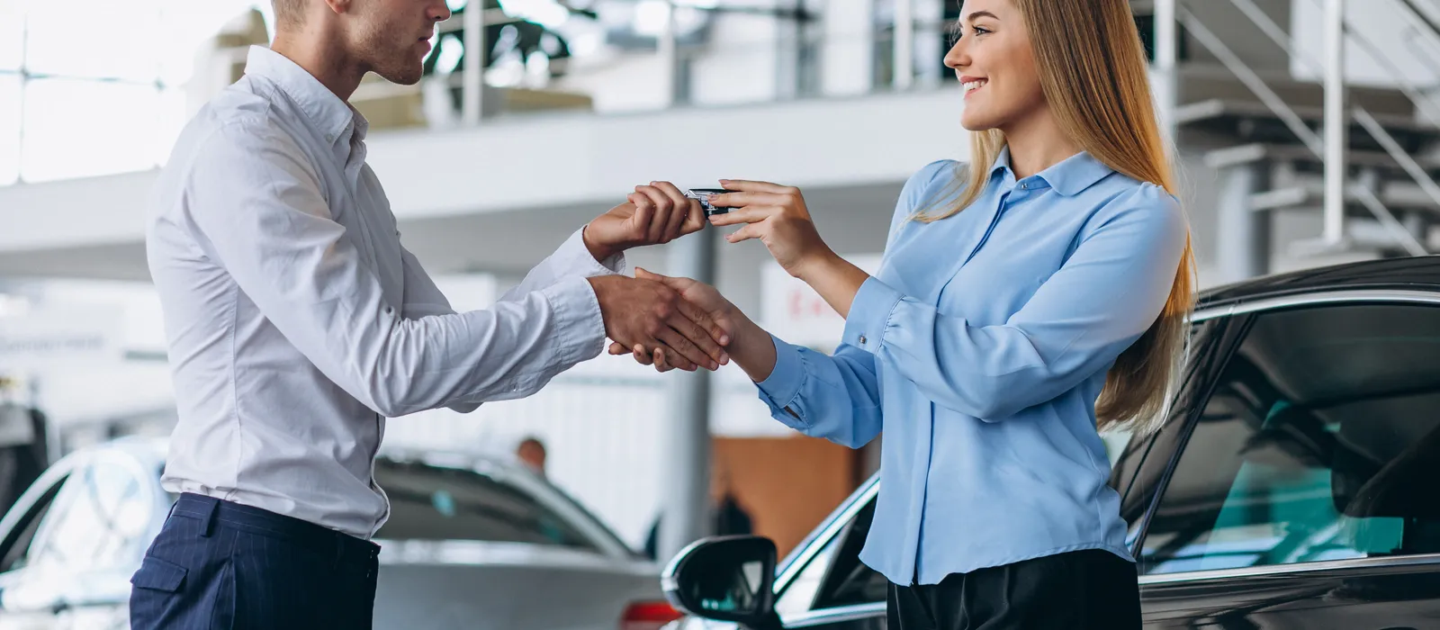1775926095-customer-making-purchase-car-showroom