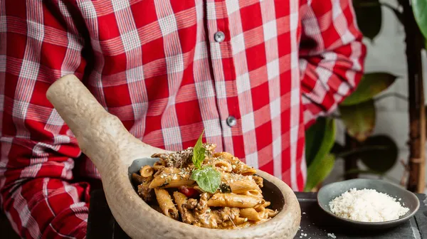 Penne pasta with cream herbs meat