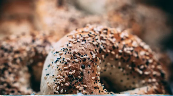 Closeup shot bunch bagels covered sesame seeds