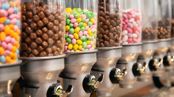 Bright candies containers by weight candy store