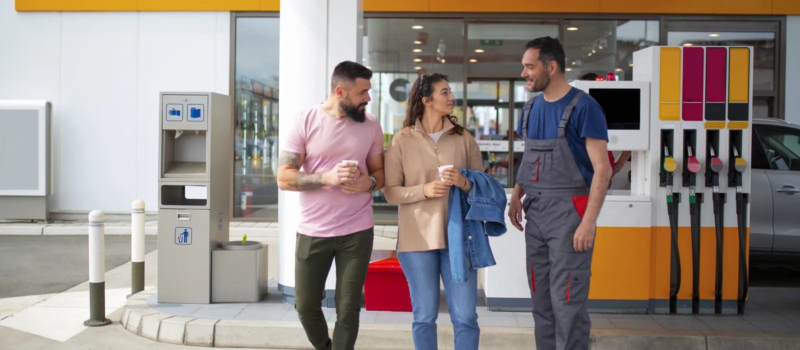People spending time gas station
